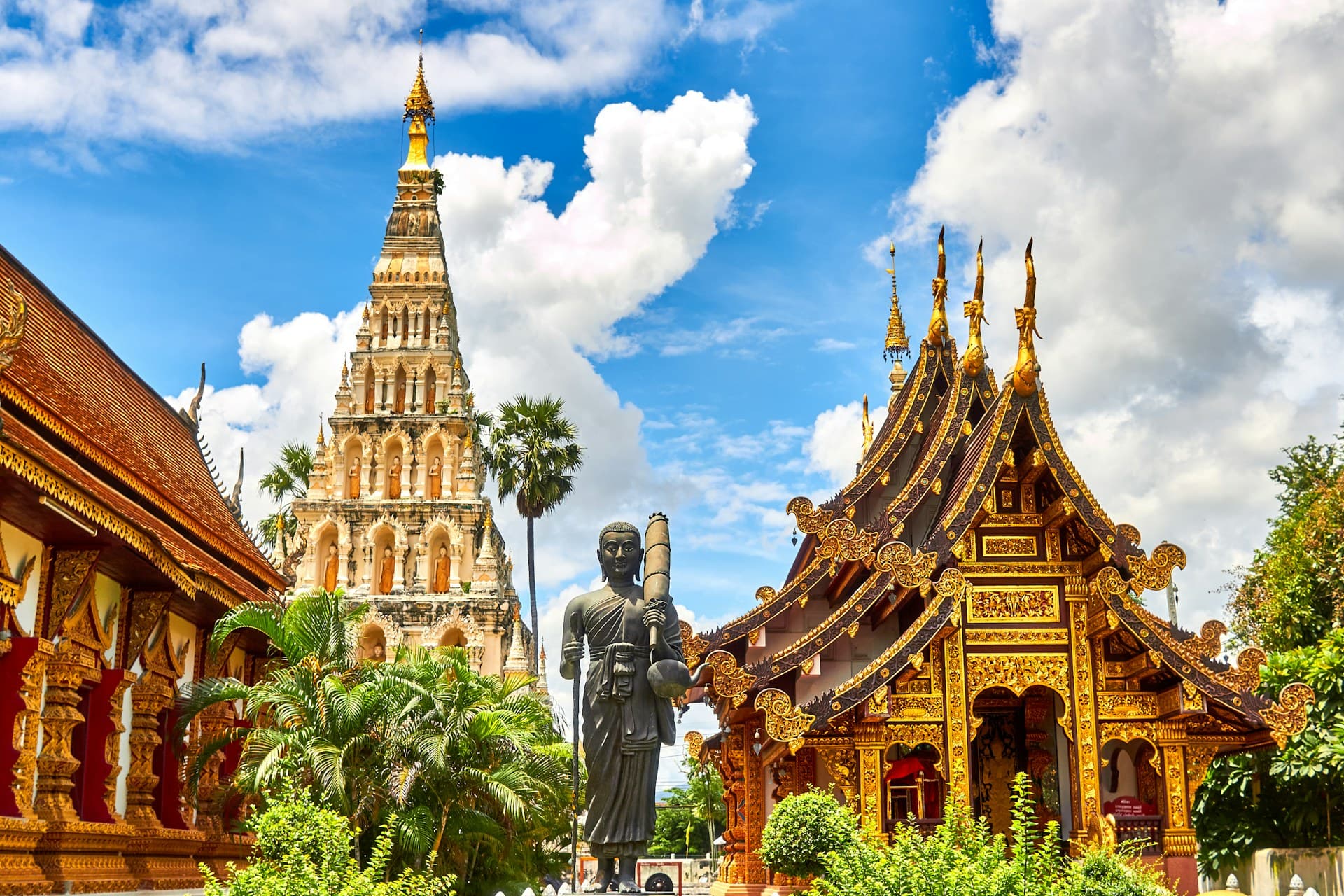 Golden temple spires in Thailand at daylight